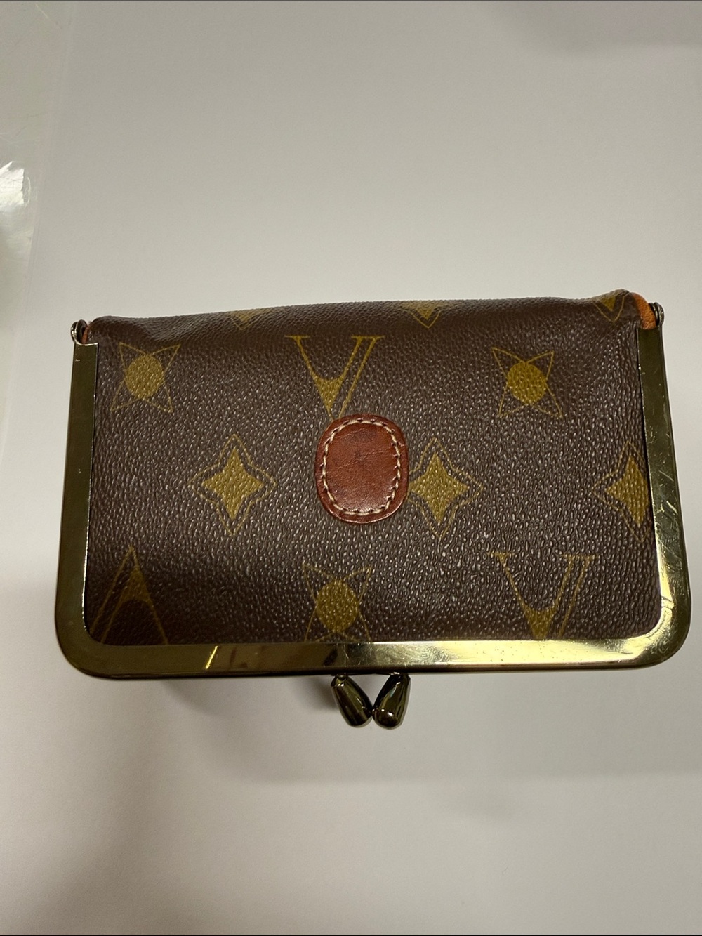 Vespucci monogram vintage kisslock wallet